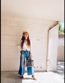 an example of casual Friday wear that is jeans and white cardigan
