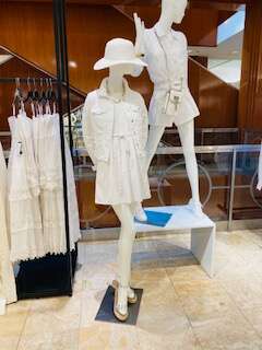 This Year's Hot Summer Fashion Trend Color Now is white. Here is a picture of display at Macy's 