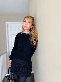 How to wear a black sweater in 3 ways example one - wear with ruffled skirt