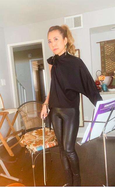 The first picture of how to create 3 outfits with a black blouse with a skinny leather pants